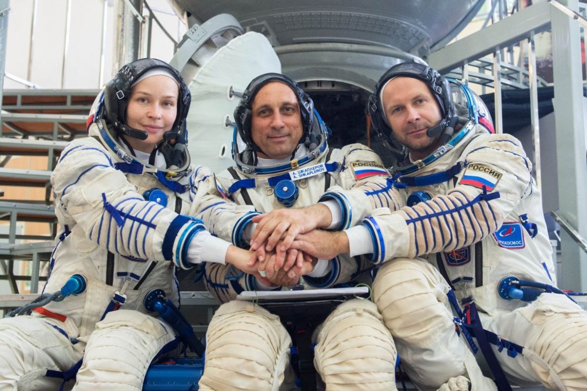 Russian film crew returns from space